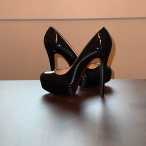Christian Louboutin Black Patent Heels. 
Size 36.